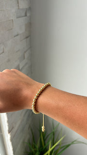 The gold bracelet